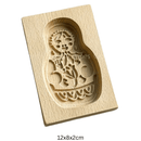 Houten koekjesvorm in kerstthema