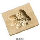 Houten koekjesvorm in kerstthema