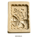 Houten koekjesvorm in kerstthema