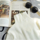 Asymmetrische Turtlenecktrui met gespleten zoom